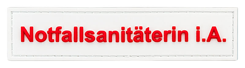 Qualifikationskennzeichnung Gummi Patch, 110x25mm, weiß mit roter Schrift Notfallsanitäterin in Ausbildung, Kletthaken aufgenäht